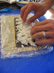 Applying Rice to Seaweed Wrapper