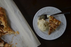 Slice of Tart with Ice Cream and White Wine Syrup