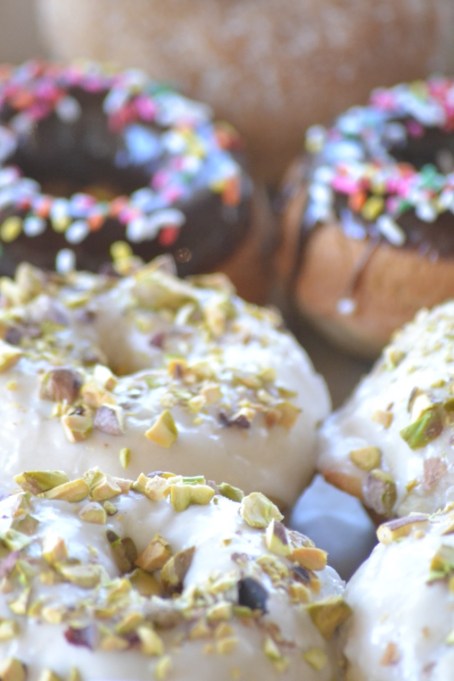 Chocolate-Glazed Donuts and Lemon-Pistachio Donuts